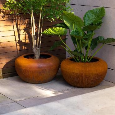 Jardinière ronde ONYX en acier Corten : L'Élégance des Formes Organiques pour Votre Jardin